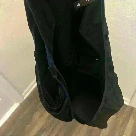 NWT!! TORRID Black asymmetrical skirted one piece bathing suit swimdress, 1X. - Picture 9 of 10